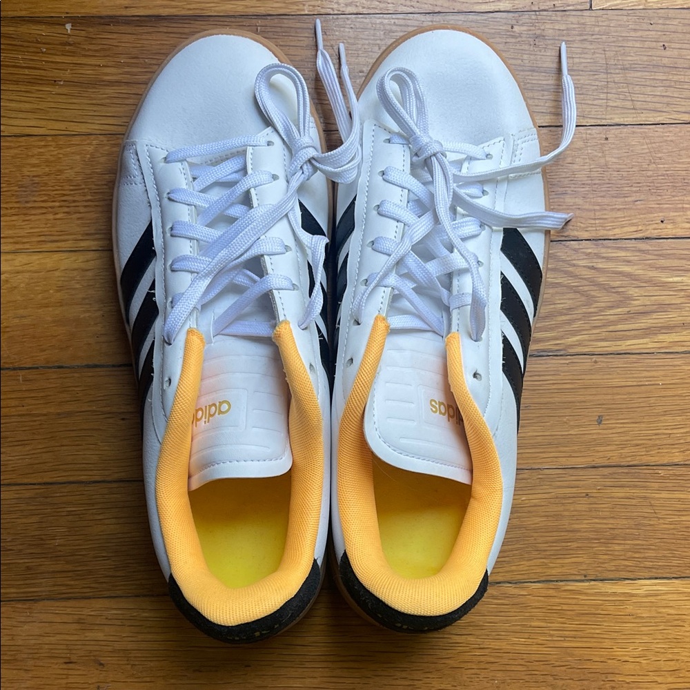 Adidas White Sneakers with Black Stripes and Yellow Highlights